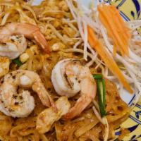 Pad Thai · Stir fried thin rice noodle with egg, bean sprout, green onions and homemade sauce topped wi...