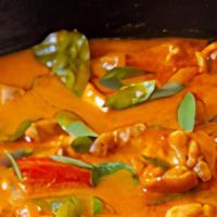 Panang Curry With Jasmine Rice · Red curry paste in coconut milk, red/green bellpeppers, basil leaves, fresh chilli.