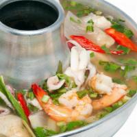 Poh Tak · Spicy Thai seafood mixed of shrimp, swai fillet, calamari, mussels, made with lemongrass, gi...