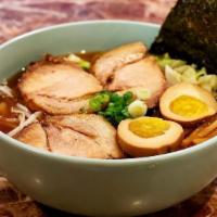 Shoyu Udon · Japanese Soy broth, with chashu, egg, bamboo, cabbage bean sport  and green onion.
