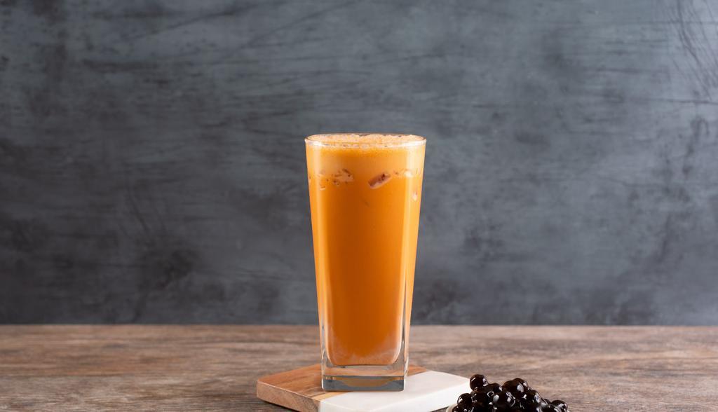 📍Thai Tea · Daily-brewed Ceylon black tea blended with tamarind seeds, cardamom, and star anise; served with  creamer.
Milk substitution unavailable.