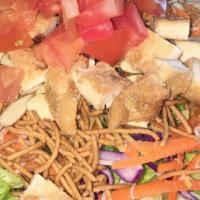 Asian Chicken Salad · Romaine, red cabbage, carrots, shredded jack and cheddar, rice noodles, almonds, and chicken...