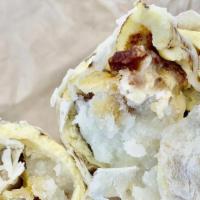 Breakfast Burrito · Eggs, cheese, bacon, sausage, and mashed potatoes.