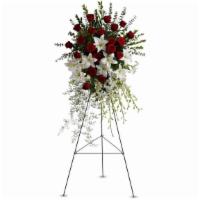 Lily & Rose Tribute Spray By Teleflora · Pure white lilies and dendrobium orchids mingle with red roses, white Asiatic lilies and mor...