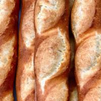 Baguette · Crusty outside and chewy inside, traditional French baguette.