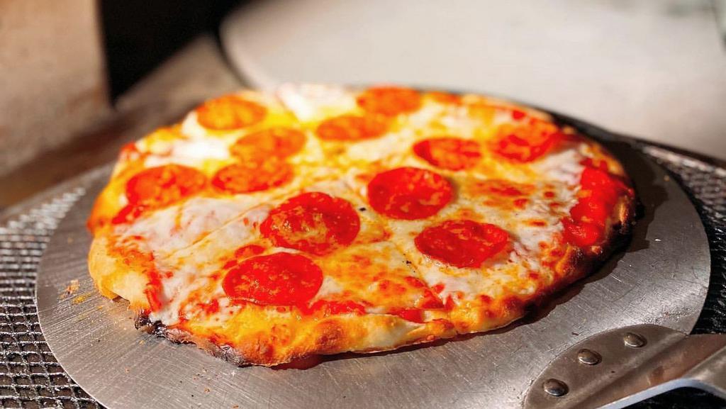 Pepperoni · Pepperoni thin crust pizza.