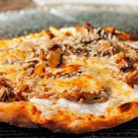 Mixed Mushroom · Japanese mushrooms, garlic butter, and soy sauce thin crust pizza.