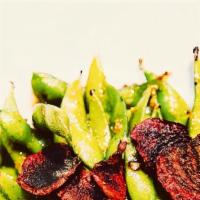 Edamame · Steamed Japanese soybean pods, lightly salted.