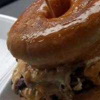 Donut Burger · Bigworm's customized glazed donut 2 patties with cheese 2 slices of bacon 1 egg and topped o...