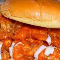 Buffalo Chicken Sandwich · Crispy breaded chicken breast tossed in buffalo sauce and topped with tomato, lettuce, and s...