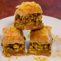 Baklava ( 3 Pieces ) · Phyllo dough topped with walnuts, pistachios, and sugar.