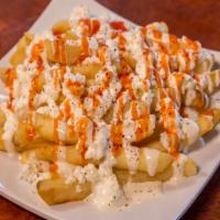 Greek Fries · French fries with garlic, house sauce and feta cheese.