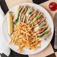 New York Turkey Club · Oven roasted Turkey breast, crisp bacon, lettuce and tomatoes, a triple-decker on toasted so...