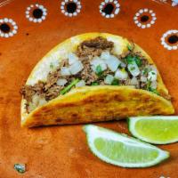 Beef Birria Taco · Flavorful beef birria taco topped with cilantro and onions. (no cheese)  add cheese below.