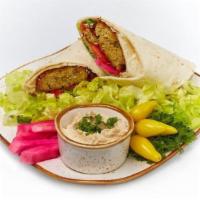 Falafel Wrap · No meat patty made with garbanzo beans, 10 different herbs, and spices. Deep fried with toma...