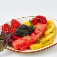 Seasonal Fruit Plate · Watermelon, pineapple, raspberry, blackberry, strawberry, and mango topped with fresh mint a...