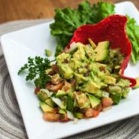 Guacamole Fresco · Gluten free. A chunky blend of ripe avocados, tomatoes, and onions with a touch of cilantro,...