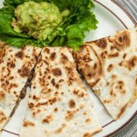 Quesadilla Avila · A large grilled flour tortilla filled with a blend of cheeses and shredded chicken or beef, ...