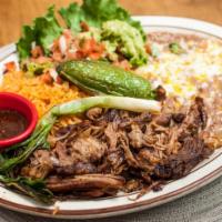 Carnitas · Chunks of lean pork cooked crispy outside and juicy inside.