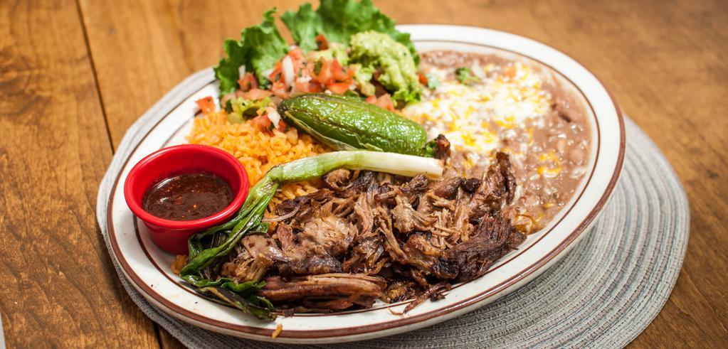 Carnitas · Delicious chunks of lean pork, marinated in lemon and garlic, tender and juicy inside, crispy outside.