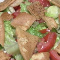 Fattoush Salad · Lettuce, tomato, cucumber with a fresh lemon juice, olive oil, mint, sumac and fried pita br...