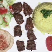 Beef Shish Kebab · Tender lamb chunks marinated and grilled, with jalapeno and tomato.