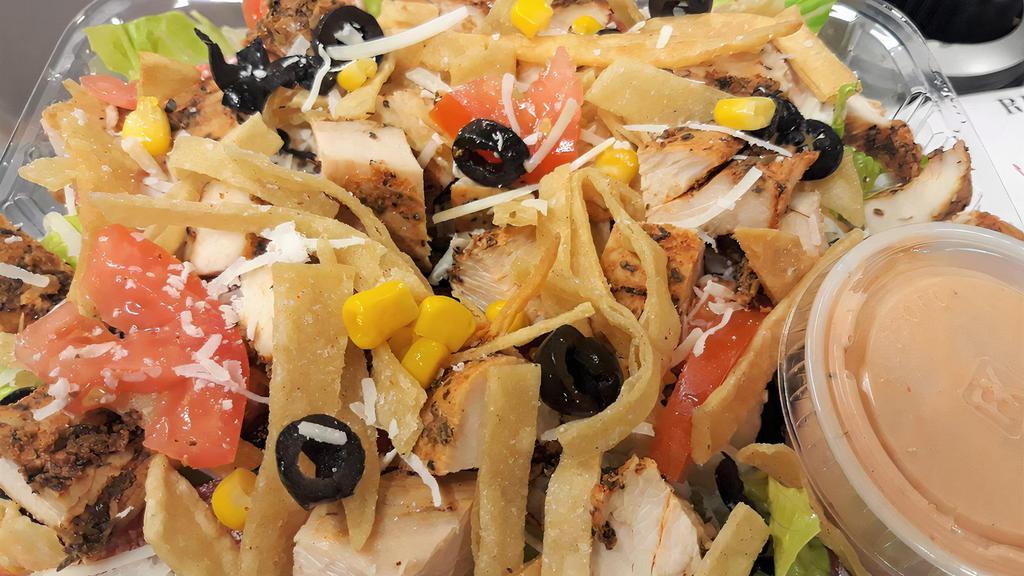 Santa Fe Salad · Chicken breast, Romaine lettuce, corn, black olives, Parmesan, tomatoes, tortilla strips and chipotle sauce.