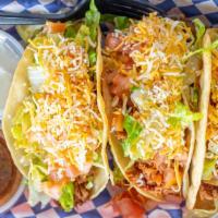 Beef Birria Tacos (3) · Beef birria, lettuce, diced tomatoes and shredded cheese on a pan fried semi hard tortilla s...