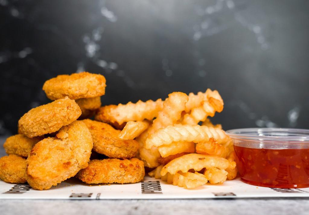12 Impossible Nuggets · 12 Crispy Impossible chicken nuggets fried to perfection and served with fries along with your choice of dipping sauce