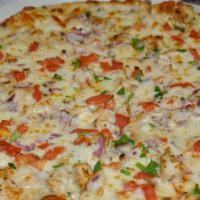 Roasted Garlic Chicken · Creamy garlic sauce, sliced chicken breast, red onions and tomatoes.
