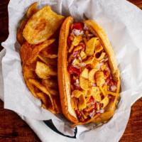 The Firehouse · All-beef hot dog, on a plain bun with chili, crunchy corn chips, Cheddar cheese, and red oni...