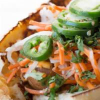 Bahn Mi Dog · Sweet chicken sausage, grilled baguette, Sriracha mayo, pickled veggies, jalapeño and cilant...