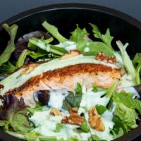 Salad + Salmon · Fresh Salmon pan-fried, with House dressing, walnuts.
