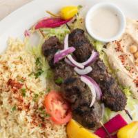 Kafta Kebab · Charbroiled, minced ground beef, with onion, parsley and our select spice mix.