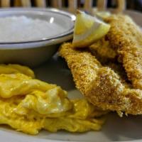 Catfish And Grits · Large filet of catfish dredged in cornmeal and deep fried to perfection. served with 2 eggs ...