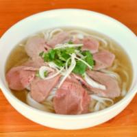 Pho Tai/Filet Mignon · Thinly sliced Rare Filet Mignon with aromatic beef broth with fresh rice noodles. topped wit...