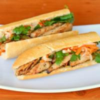 Banh Mi Ga/Chicken · Grilled Lemongrass Free Range Chicken 12” baguette warm french baguette served with house ma...