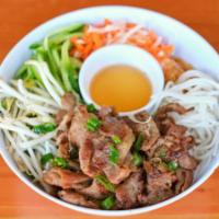 Bun Thit/Pork · Grilled Pork with cold vermicelli noodles served on a bed of lettuce, fresh. herbs, cucumber...