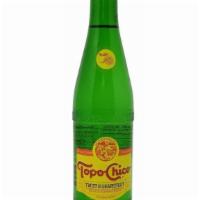 Topo Chico Sparkling Mineral Water W/ Grapefruit Essence · Subtle grapefruit essence.