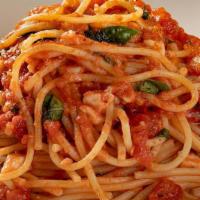 Spaghetti Pomodoro · Housemade tomato compote, basil, parmesan .