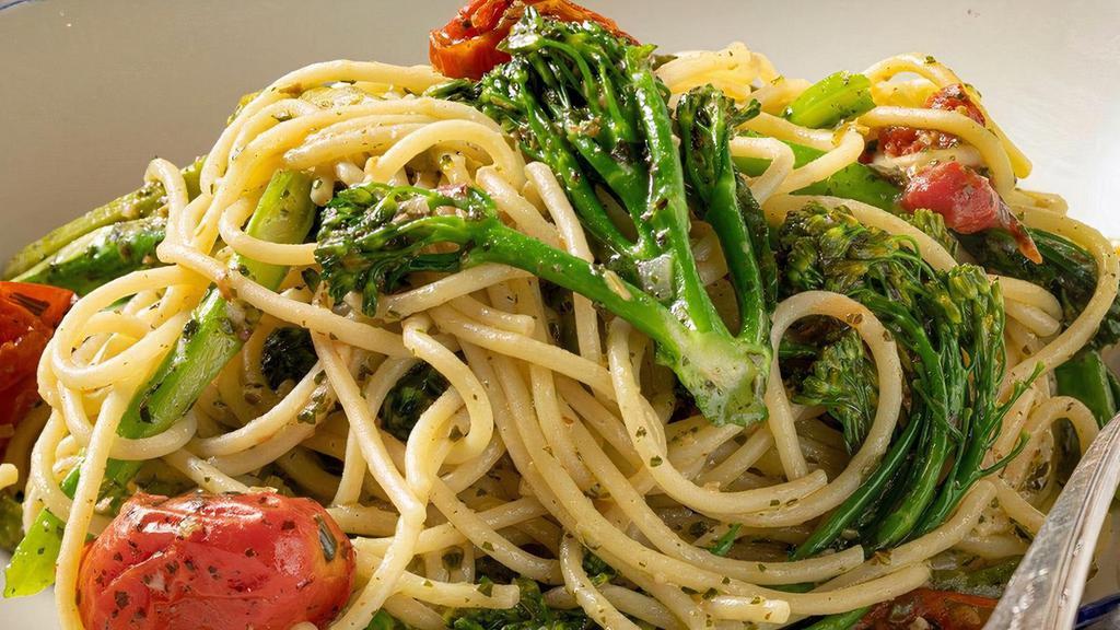 Pesto Primavera · Grilled asparagus, roasted grape tomatoes, broccolini®, spaghetti, house pesto sauce.