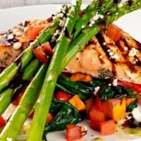 Grilled Salmon Fresca* · : Grilled salmon, asparagus, sweet potatoes, spinach, red peppers, feta, roma tomatoes, pest...