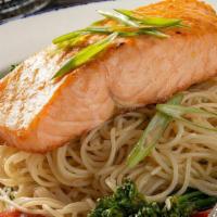 Grilled Salmon Pasta · Grilled salmon, roasted grape tomatoes, broccolini® & garlic in a white wine & scampi sauce.