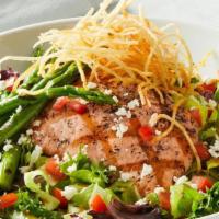 Grilled Salmon Salad* · Grilled salmon, field greens, tomatoes, grilled asparagus, feta, crispy shoestring potatoes,...