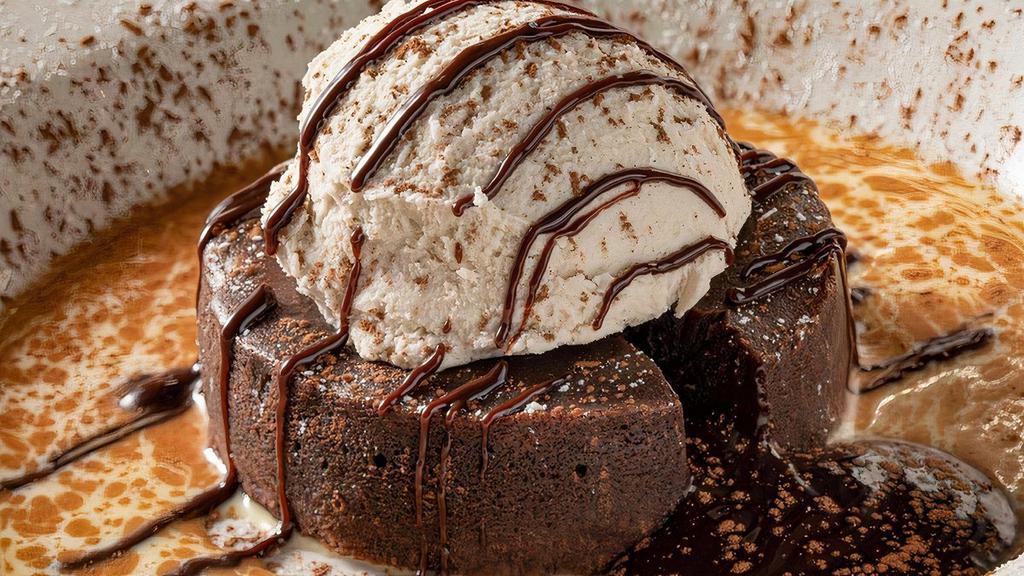 Warm Chocolate Cake · Molten chocolate cake, anglaise, vanilla gelato