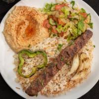 Kafta Kebab · Ground beef kebab. Served with rice, two sides, pita bread, and sauce.