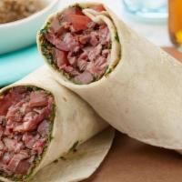 Asada Burrito · Includes beans rice onion cilantro and steak
