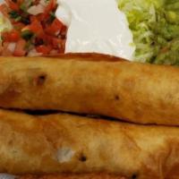 Chicken Or Beef Flautas (3) · Chicken or shredded beef in a flour shell with sour cream and guacamole on the side.