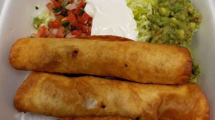Chicken Or Beef Flautas (3) · Chicken or shredded beef in a flour shell with sour cream and guacamole on the side.