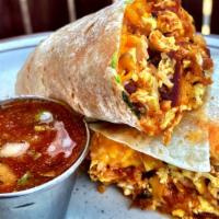 Breakfast Burrito · Burrito with scrambled eggs, hash browns, choice of meat, American cheese & salsa.